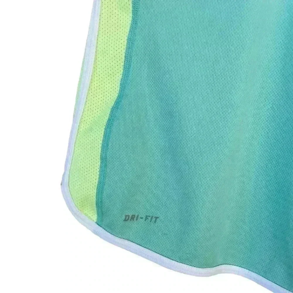 NIKE women’s workout tank top bright yellow and aqua blue size M used no flows